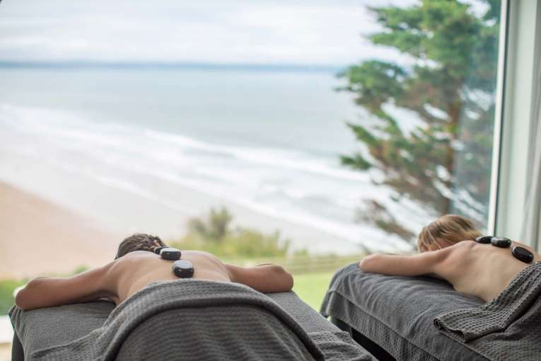 Saunton Sands Hotel Source Spa Guests Receiving Hot Stone Massages in Treatment Room