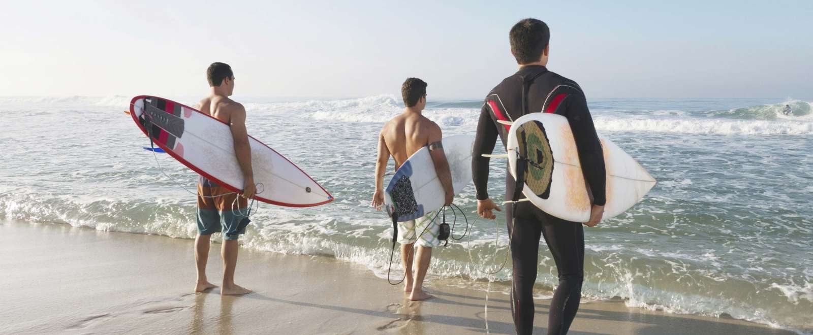 Saunton Sands Hotel Group of Guests With Surfboards on Saunton Beach
