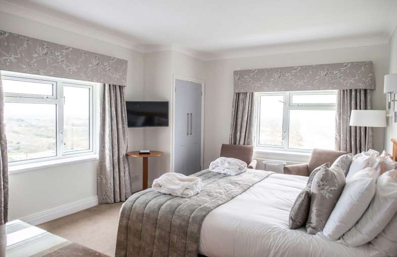 Saunton Sands Hotel Family Suite (308) Accommodation Bedroom with Television and Sea View