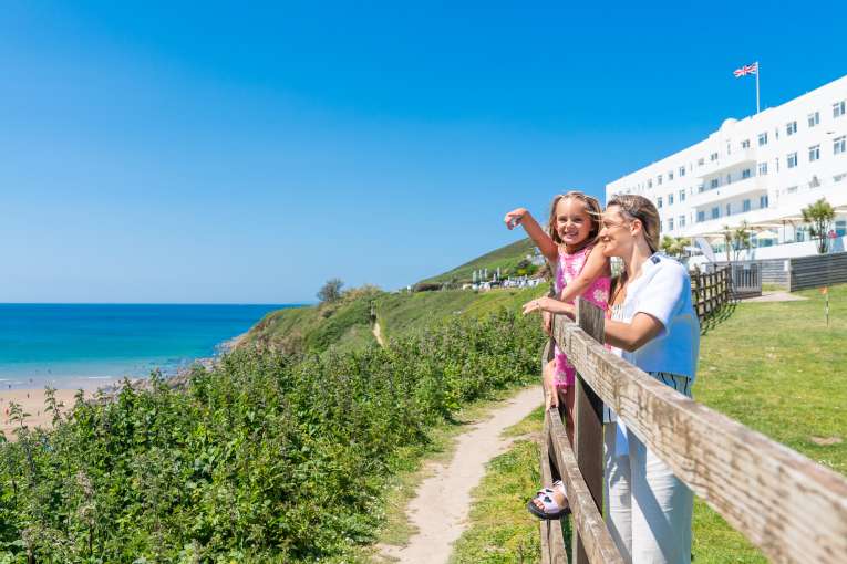 Mum and daughter looking at the view outside