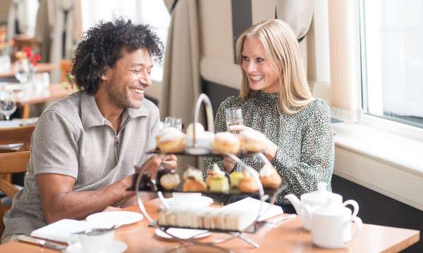 Couple enjoying an Afternoon Tea in The Dining Room