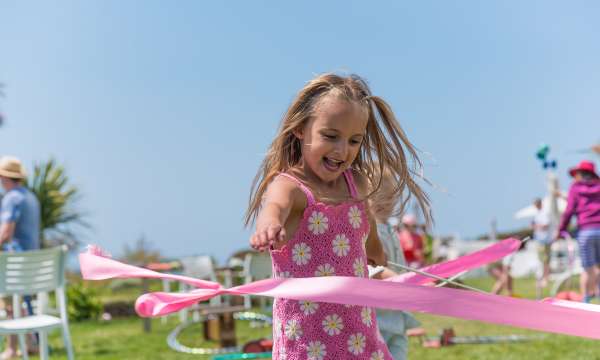 Girl playing at the circus workshop